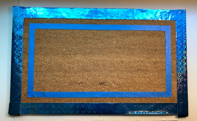 Doormat with tape removed